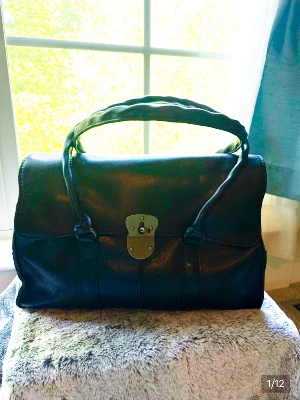 Patricia Nash Classic Black Leather Shoulder Bag with Turn-Lock Closure.